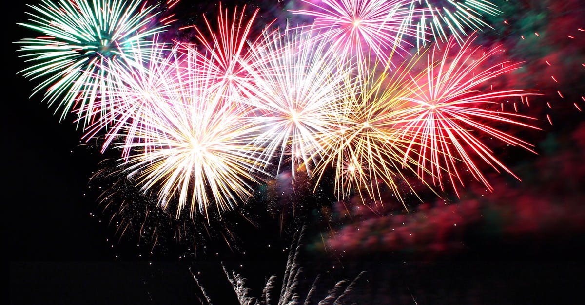 Spectacular fireworks display lighting up the night sky over Bournemouth Pier, England.